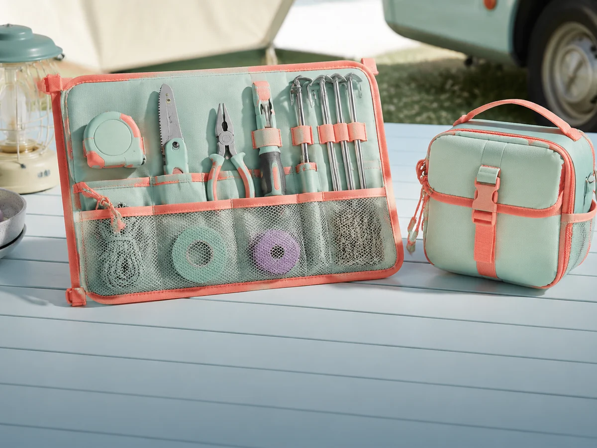An open modular tool roll organizing measuring, cutting, fastening, and repair essentials.